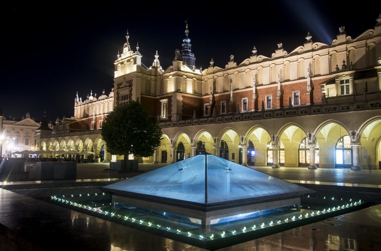 Krakow Main Square at night with underground museum
